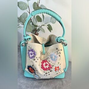 BCBGMaxAzria Studded And Embroidered Canvas Bag
